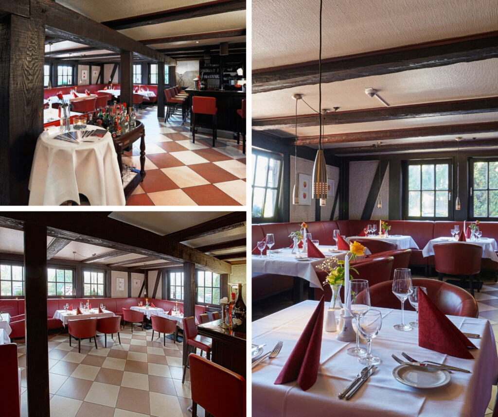 Restaurant im Fachwerkstil mit dunkelroten Sitzmöbeln